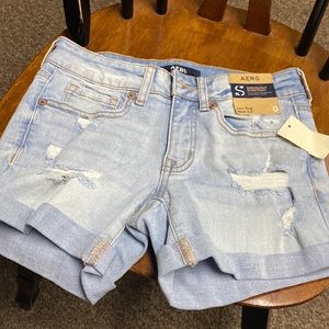 Aero size 0 denim distressed shorts.  New with tags